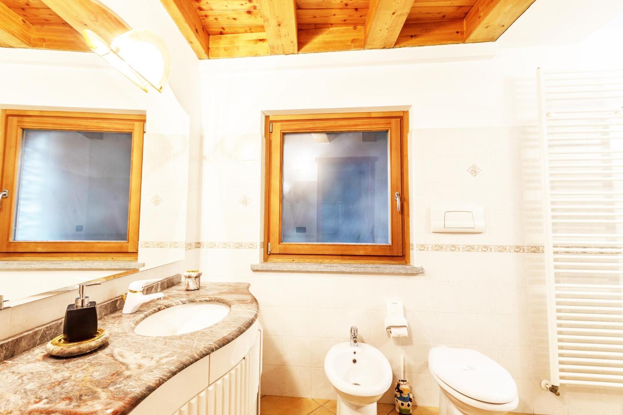 Апартаменты Casa Alpina - Sarre Аоста Номер фото